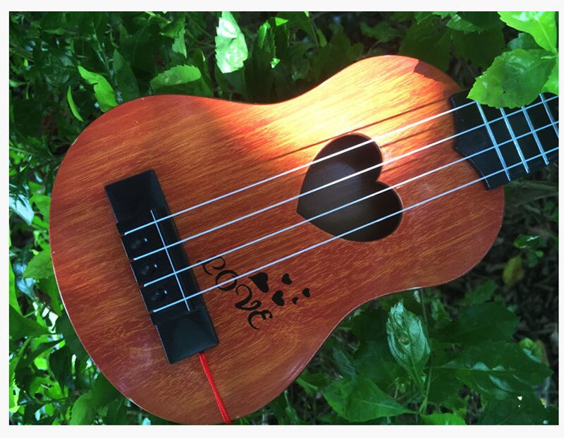 Mini-Ukulele-de-Simulation-de-guitare-pour-enfants-nouveau-jouet-instrument-de-musique-d-veloppement-de