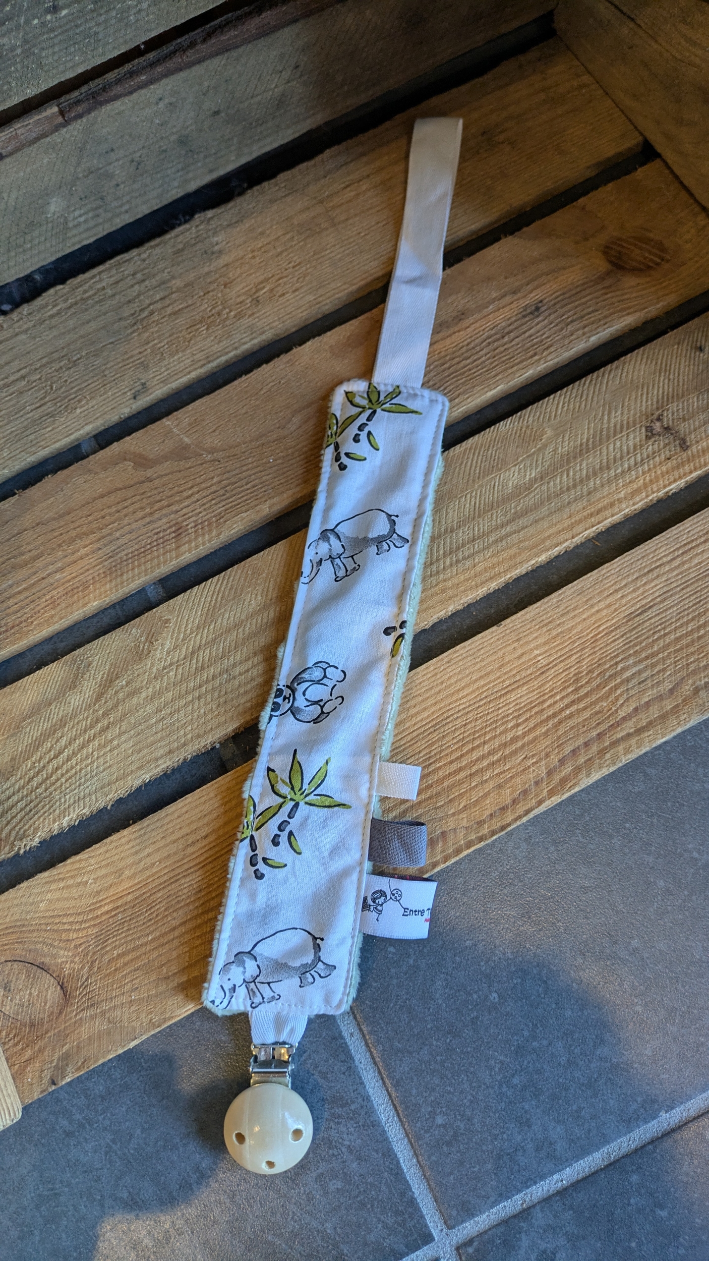 attache tétine