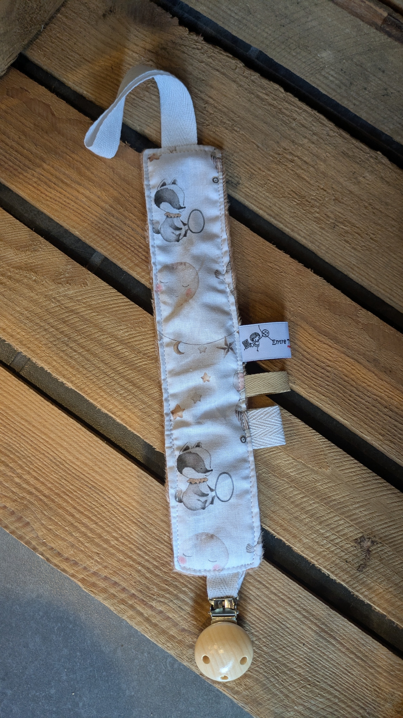 attache tétine