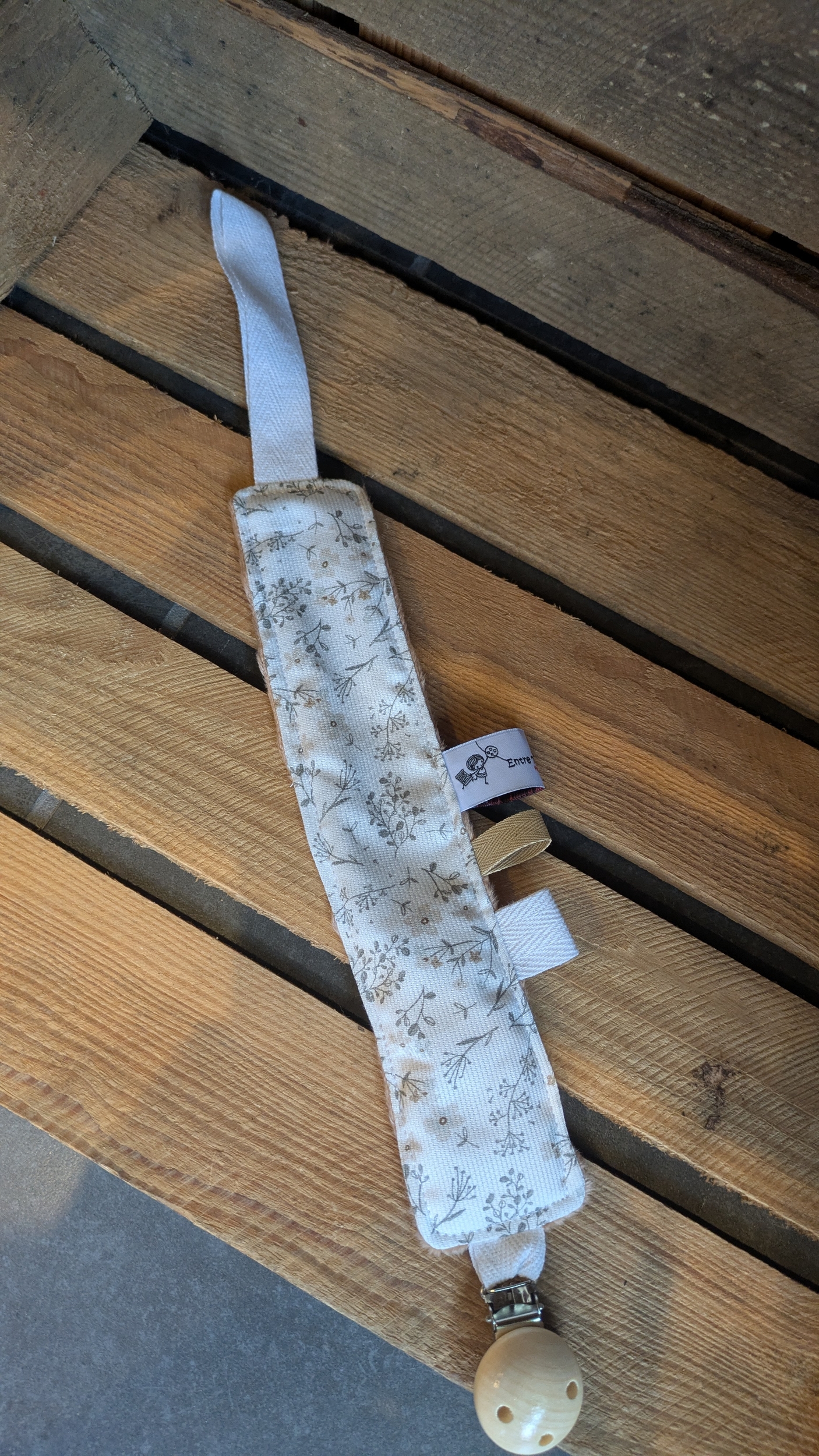 attache tétine