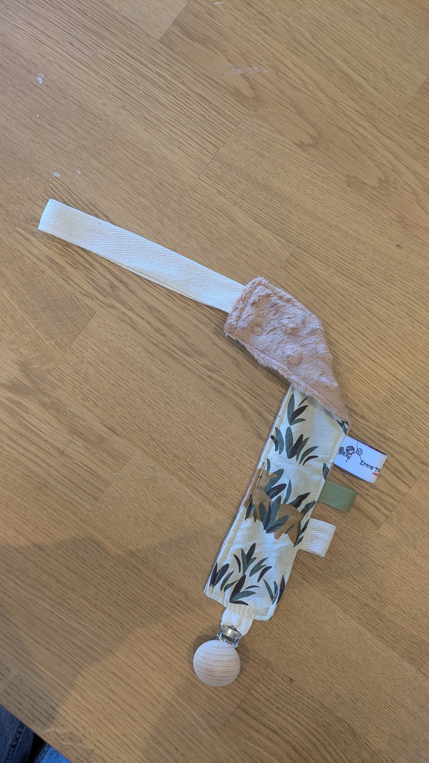 attache tétine