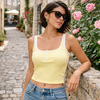 top côtelé jaune femme avec boutons et coupe ajustée