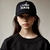 young_girl_black_cap_facing_forward 2