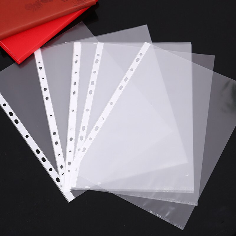 Pochettes perforées en plastique transparent format A4 - Maison &  Déco/Fournitures de bureau - Merci Boutique