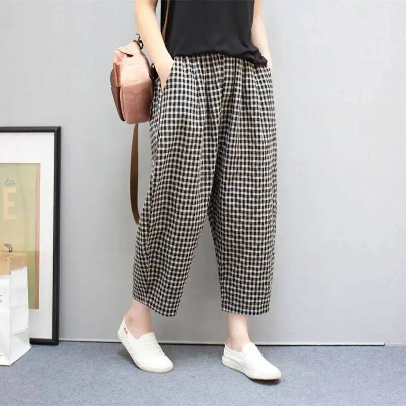 Pantalon large à carreaux pour femme