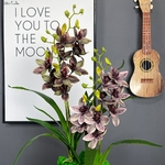 Bouquet-d-orchid-es-Cymbidium-fait-au-soleil-toucher-r-el-avec-fausses-feuilles-Flores-artificielles