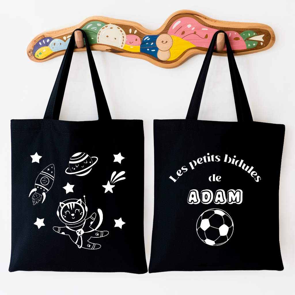 Tote bag bébé personnalisé recto Cap sur les étoiles et verso prénom en coton noir avec flocage blanc - MARJANE et Cie
