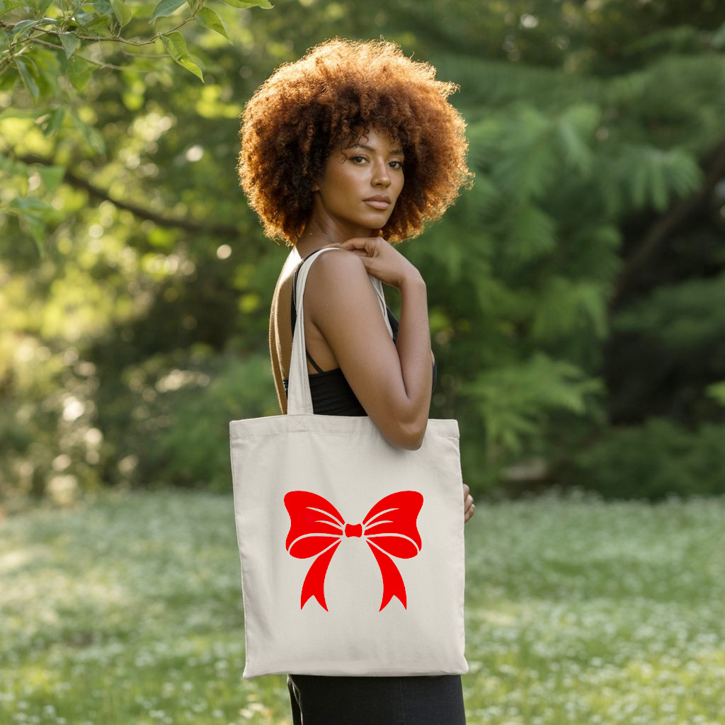 Tote bag femme porté, illustration de nœud rouge moderne et affirmé, flocage - MARJANE et Cie