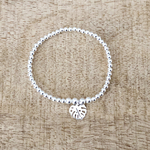 Bracelet ABICHAM5 argent perles et breloque feuille de philodendron-elastique