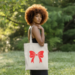Tote bag femme porté, illustration de nœud rouge moderne et affirmé, flocage - MARJANE et Cie