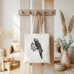 Tote bag femme verso avec illustration d’un perroquet monochrome noir suspendu à une patère - MARJANE et Cie