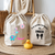 Sac pochon bébé personnalisé recto Eléphant joueur et verso prénom en coton avec flocage couleur - MARJANE et Cie