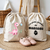 Sac pochon bébé personnalisé recto Dinosaure rose émerveillé et verso prénom en coton avec flocage couleur - MARJANE et Cie
