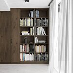 Étagère haute en noyer brun remplie de livres à côté darmoires assorties