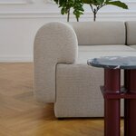 Détail de laccoudoir arrondi dun canapé modulaire beige
