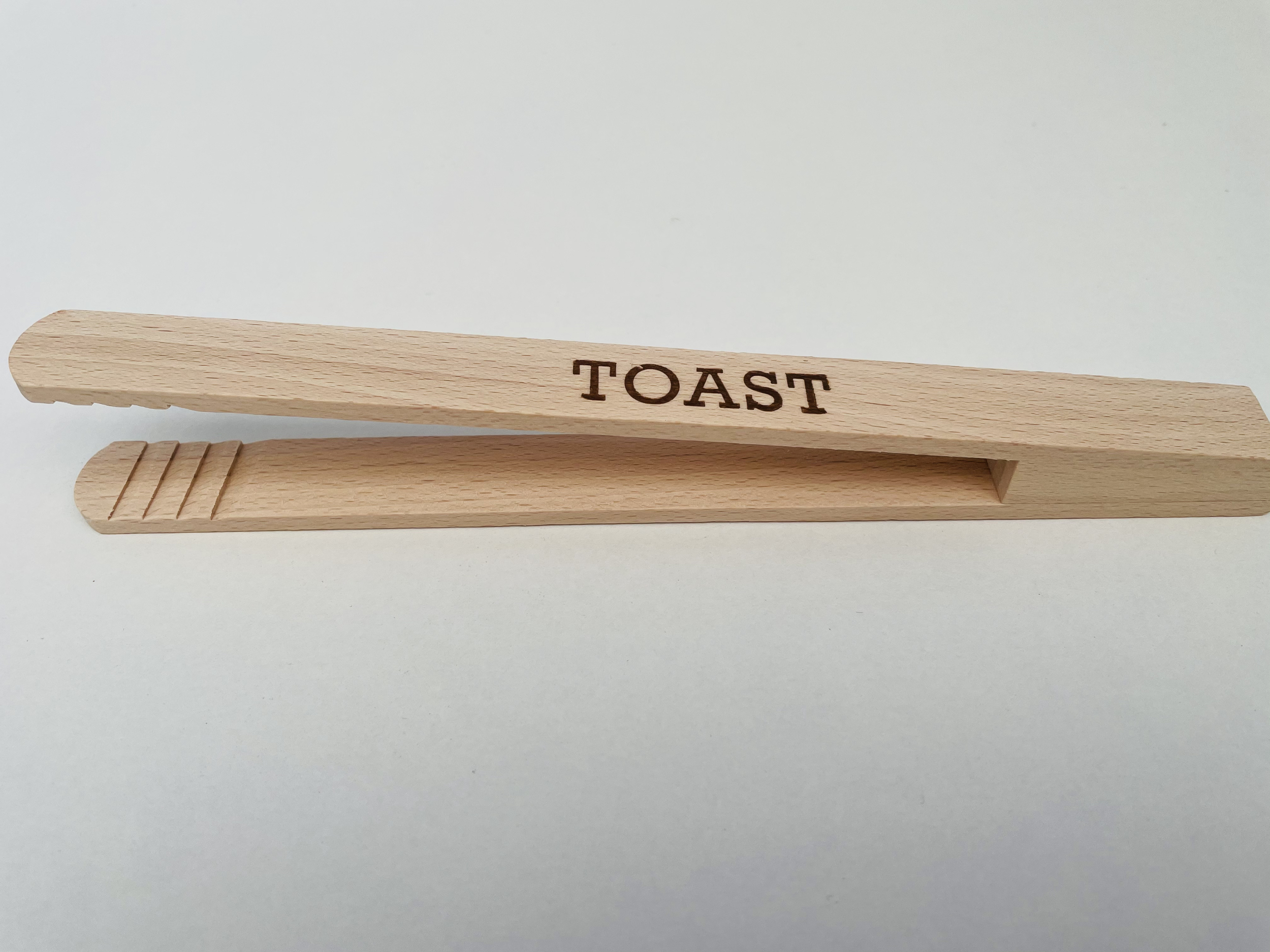 Pince à toast en bois