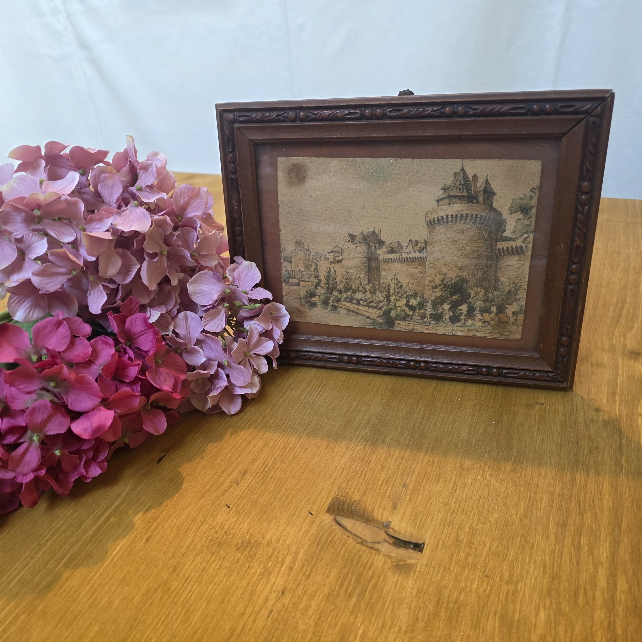 Cadre en bois avec dessin de remparts