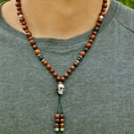 collier homme pierre et pendentif crâne