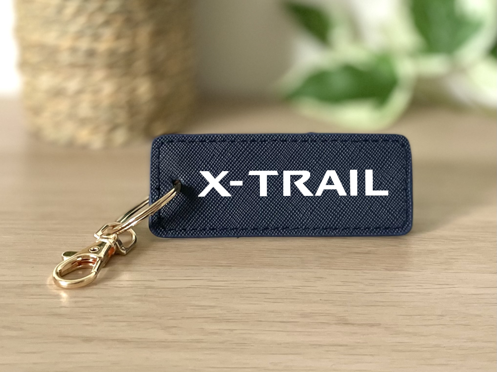 Porte clé x-trail bleu