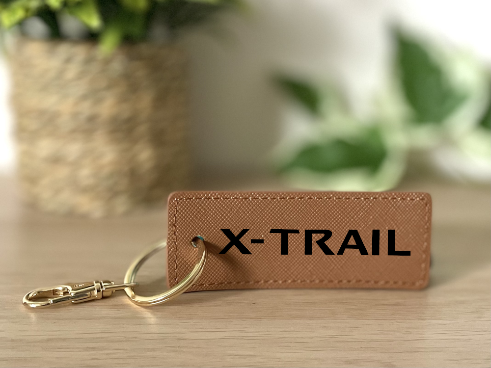 Porte clé x-trail marron