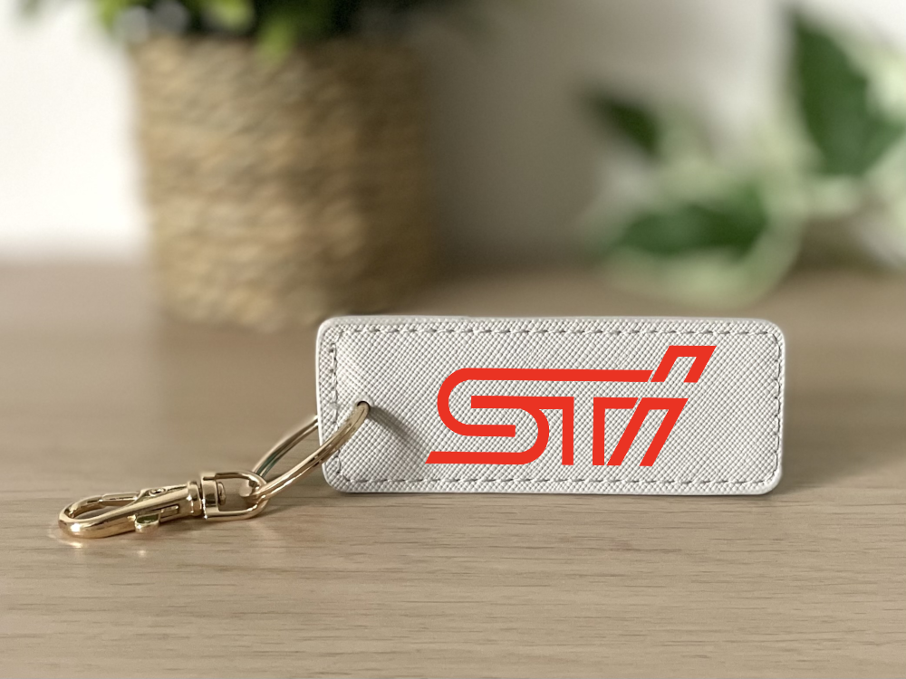 Porte clés STI gris