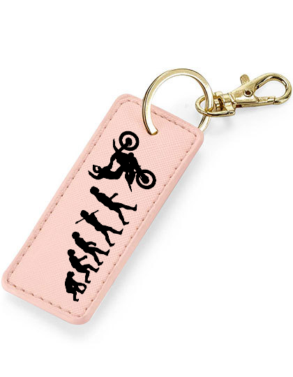 Porte clés évolution homme wheeling rose
