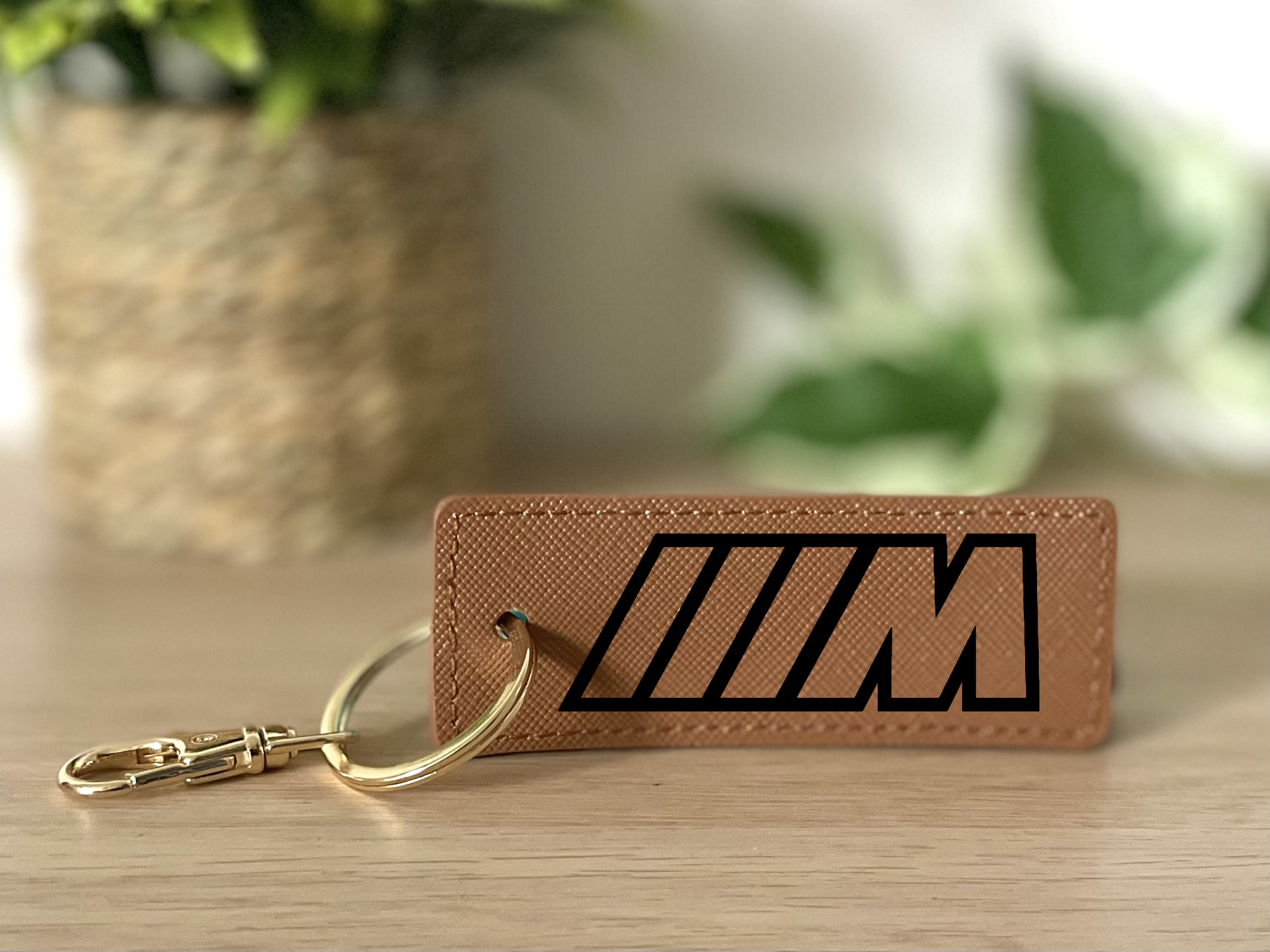 Porte clés M marron
