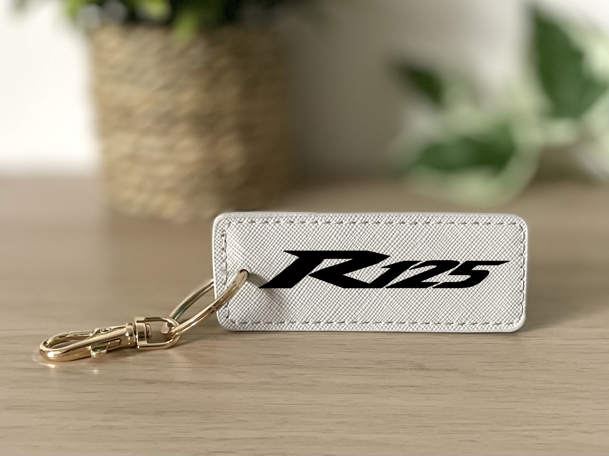 Porte clés R125 gris