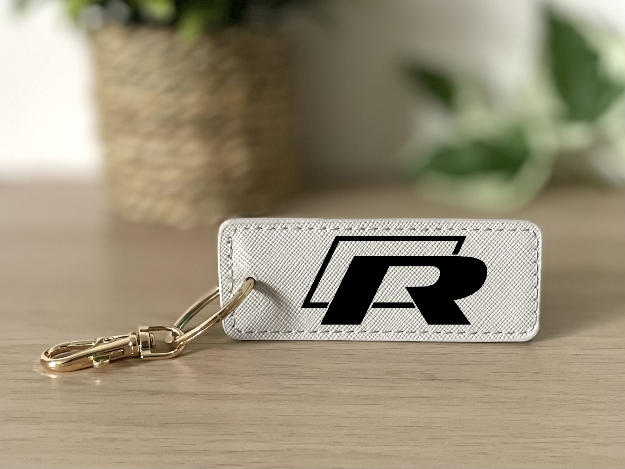 Porte clés R gris