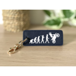 Porte clés évolution homme wheeling bleu