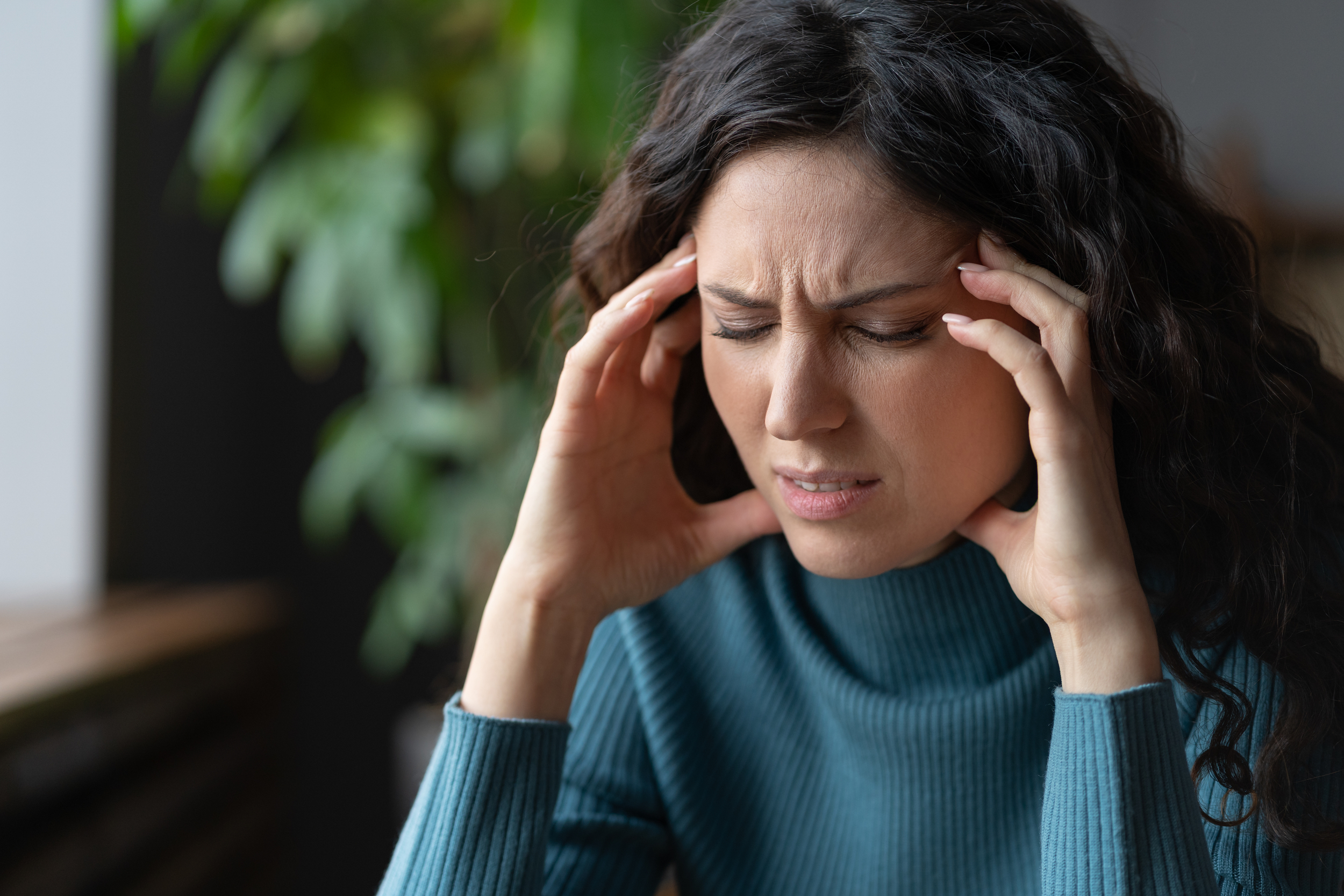 anxiety disorder stressed worried young woman with closed eyes suffering from headache or migraine