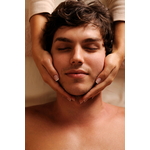 masseur-doing-massaging-temples-for-young-handsome-man-high-angle-view
