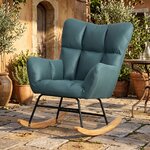 Rocking chair London Chic velours bleu canard dans un salon lumineux