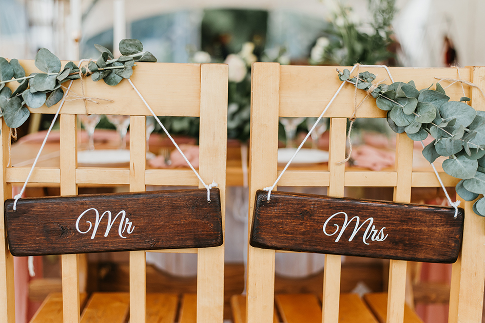 chairs-bride-groom-decorated-with-flowers-with-signs-mr-mrs-wedding-ceremony