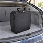 Sac carré noir pour câble rangé dans un coffre