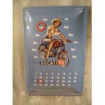 calendrier perpétuel métal en relief publicitaire moto ducati pin-up rétro vintage