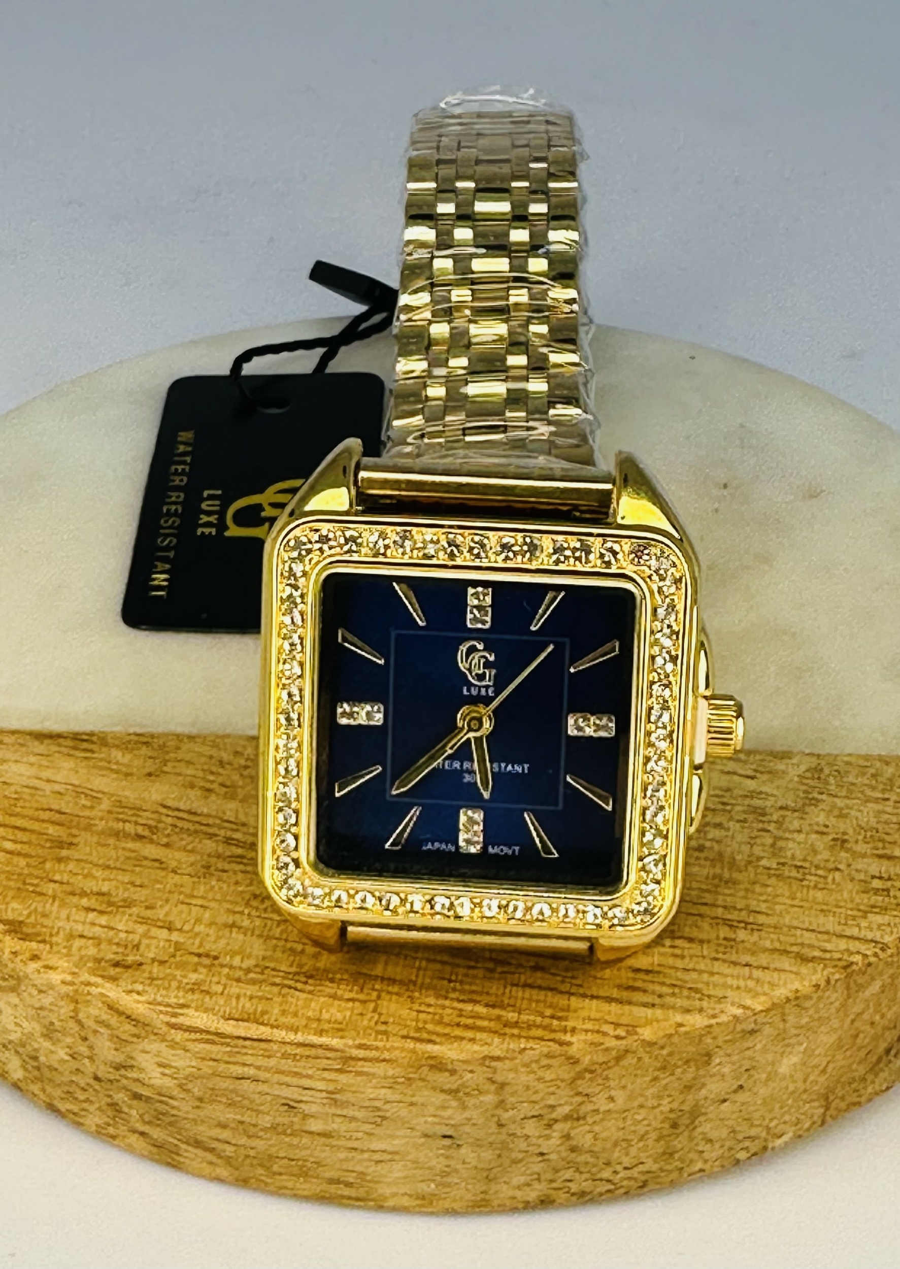 montre doré fond bleu2