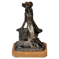 Statue en bronze 29 cm femme avec son chien