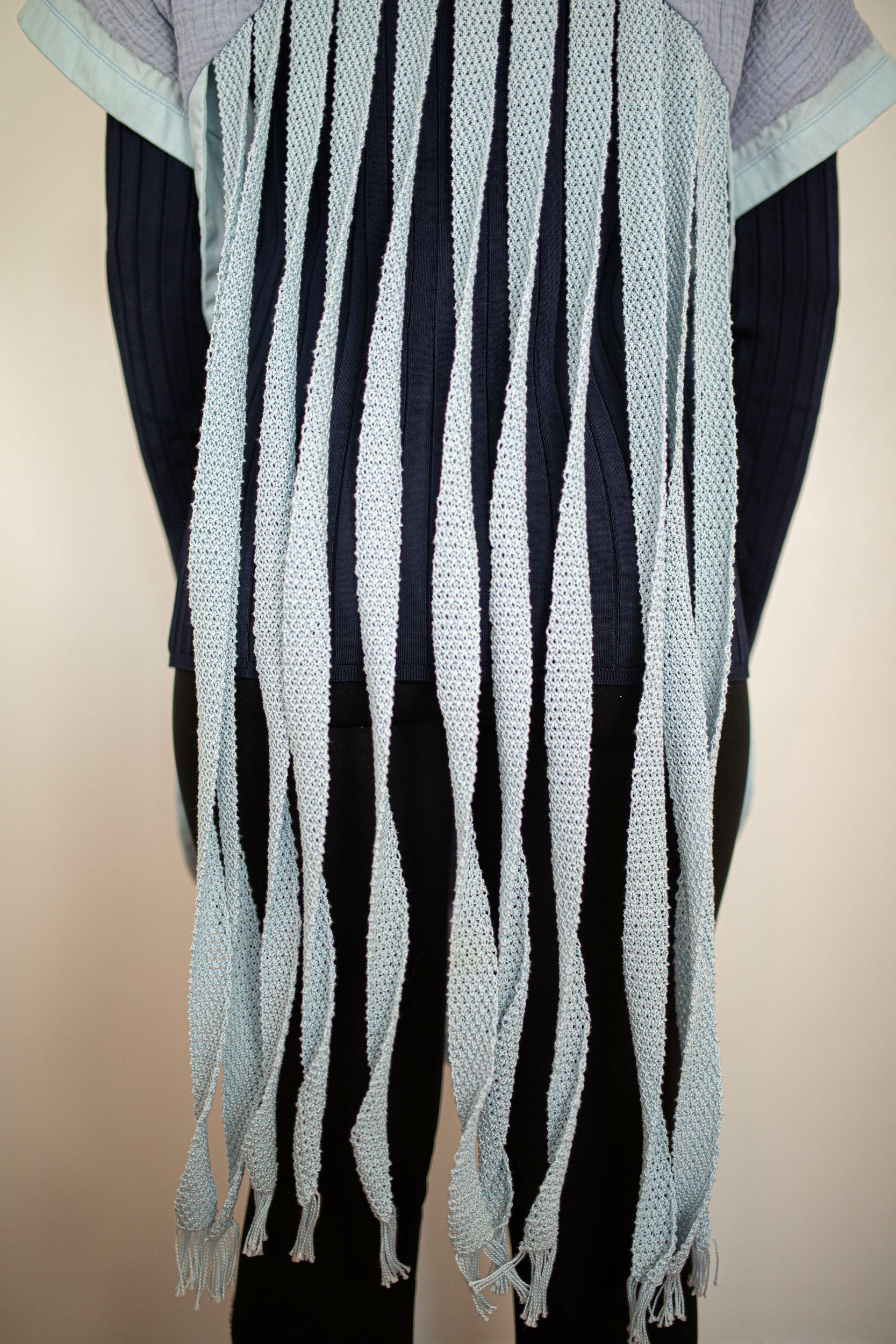 polo artisanal bleu maille coton dos franges