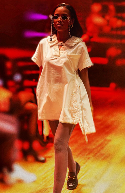Silhouette blanche avec polo et short bloomer, collection Evolution of Self – Christelle Tran-Thiet