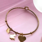 bracelet-charms-noel-acier-dore