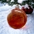 Boule de Noël orange en verre