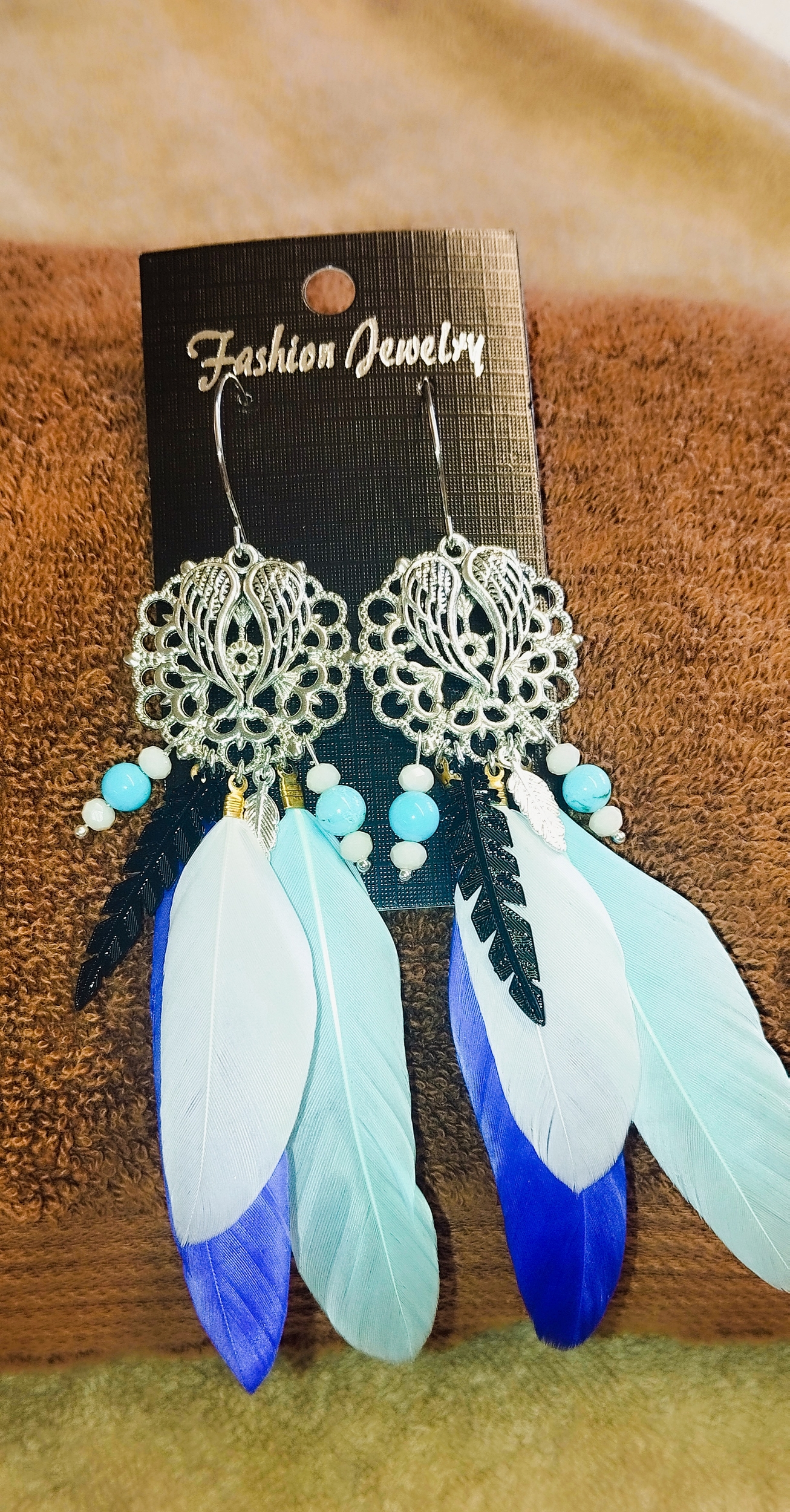 Boucles d\'oreilles Plumes bleu