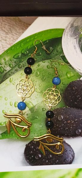 Boucles d\'oreilles Fleur de vie et Œil d\'Horus