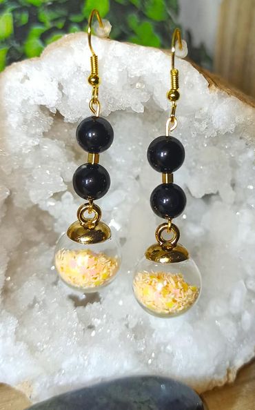 Boucles d\'oreilles boules d\'étoiles