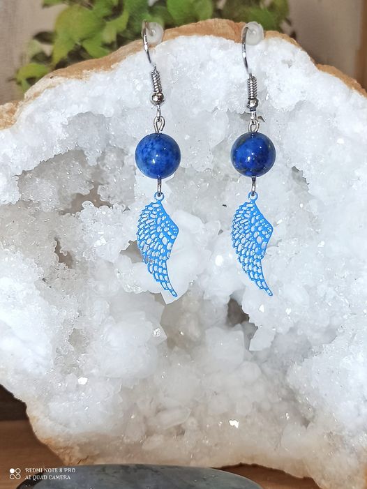 Boucles d\'oreilles plumes bleu
