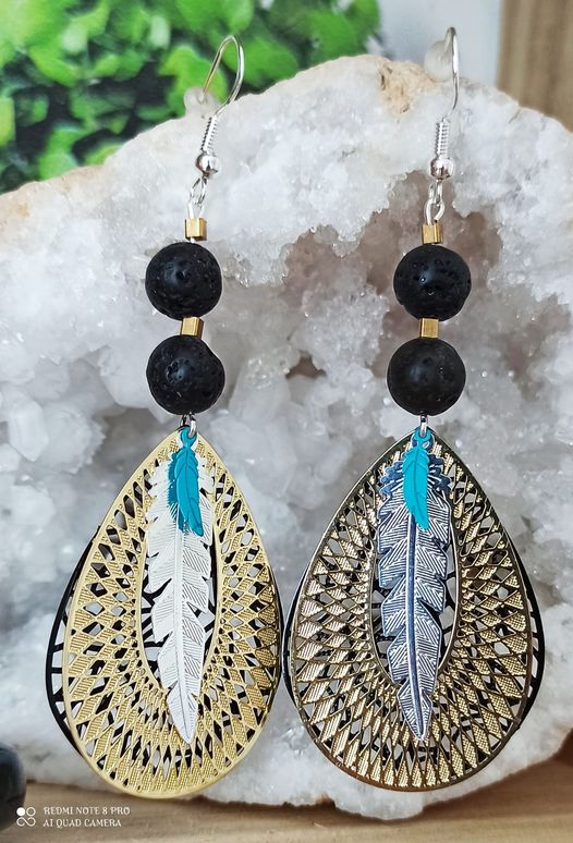 Boucles d\'oreilles plumes et courage
