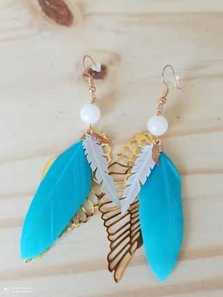 Boucles d\'oreilles plumes de chance