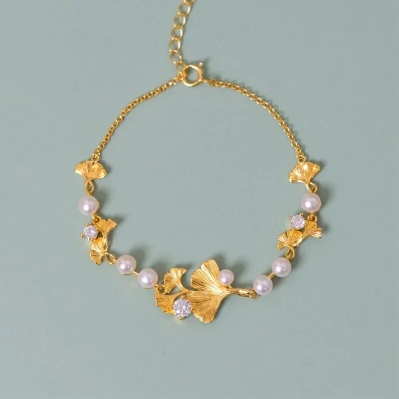 Bracelet tendance - Bracelet plaqué Or 14 carats, perles synthétiques.