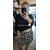 pull noir jupe plisse beige